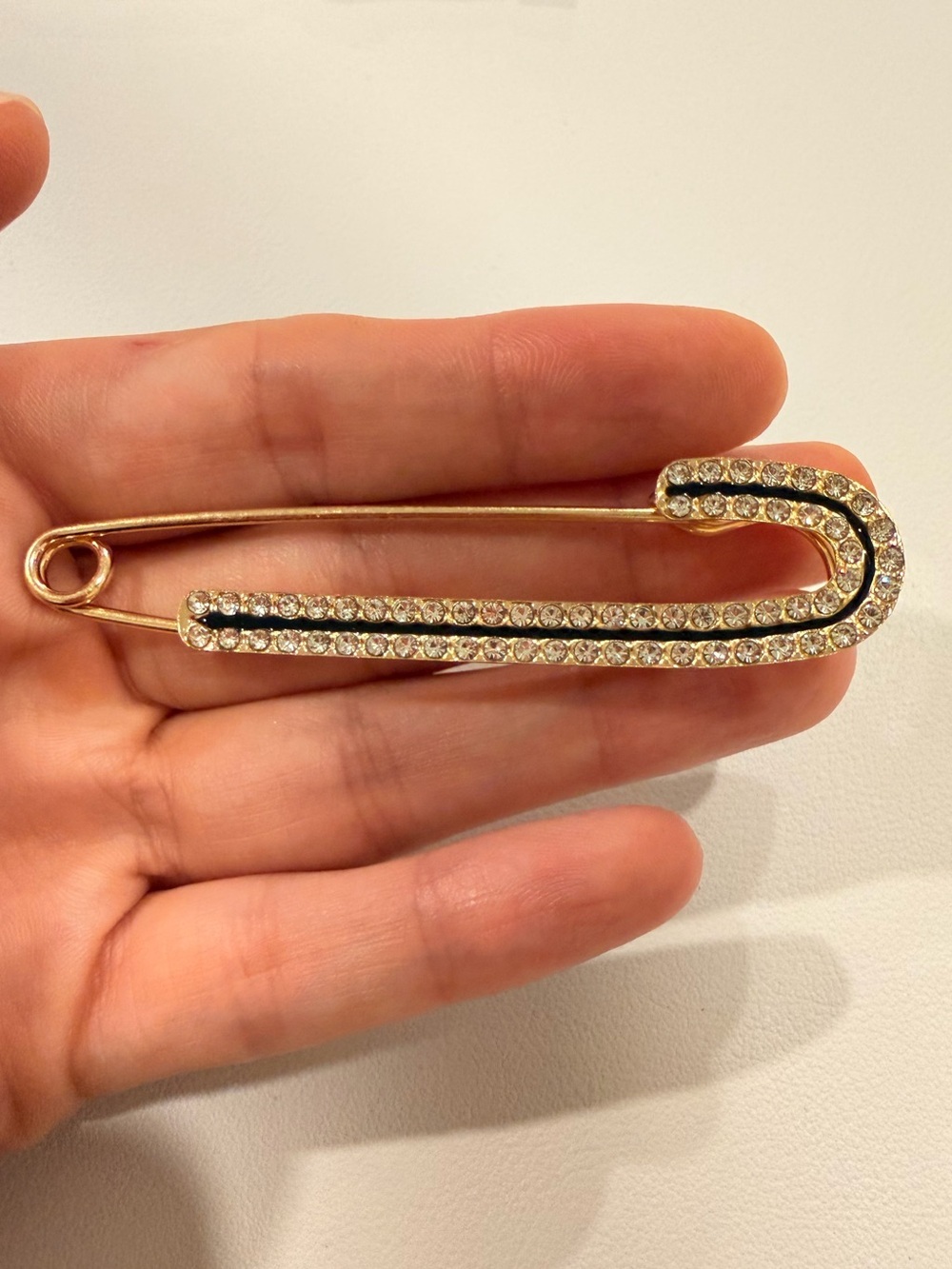 Gold-Tone Crystal Safety Pin Brooch with Black Accent